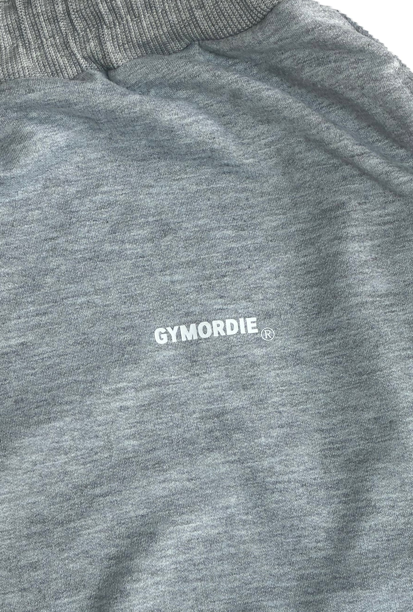 Dark grey men’s fitted jogging bottoms by GYMORDIE